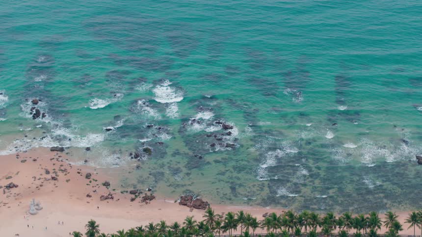 The waves slowly hit the shore