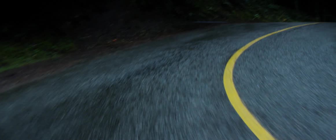 Vehicle drives on an asphalt country road