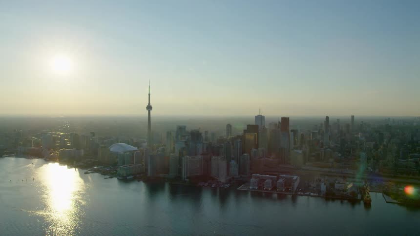 Aerial of Toronty City Skyline from the coast over Lake Ontario