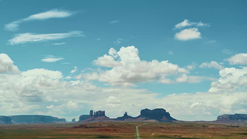 The bright and sunny sky over a vast badland