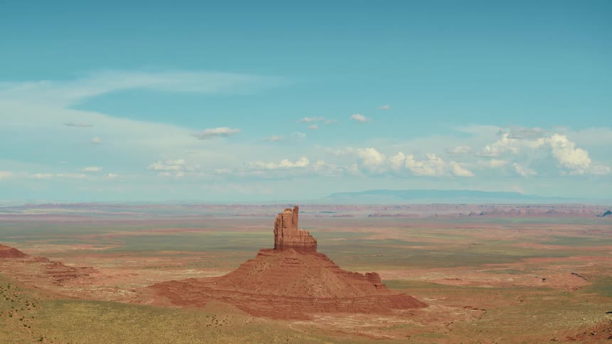 The tall rocks sit in the canyon below