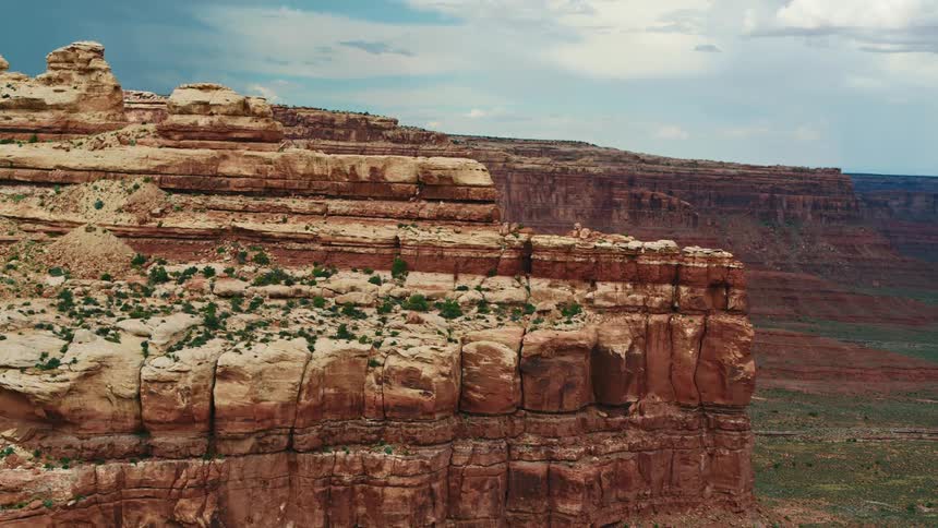 An aerial view of rocky cliffs in a desert canyon