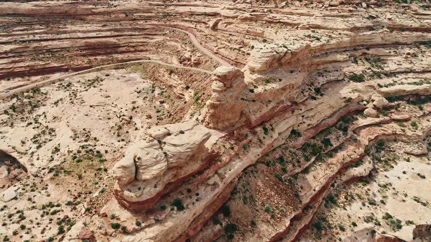 Rock formations atop a mountain in the badlands during the day