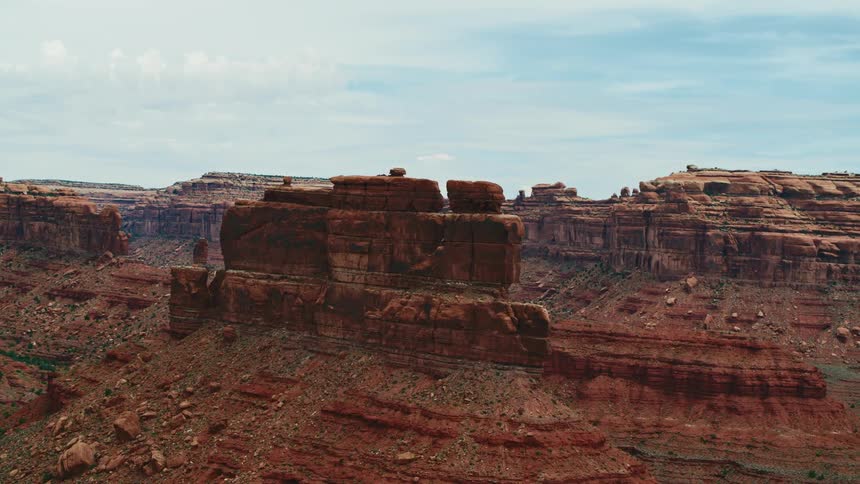 Aerial view of a cliff is displayed