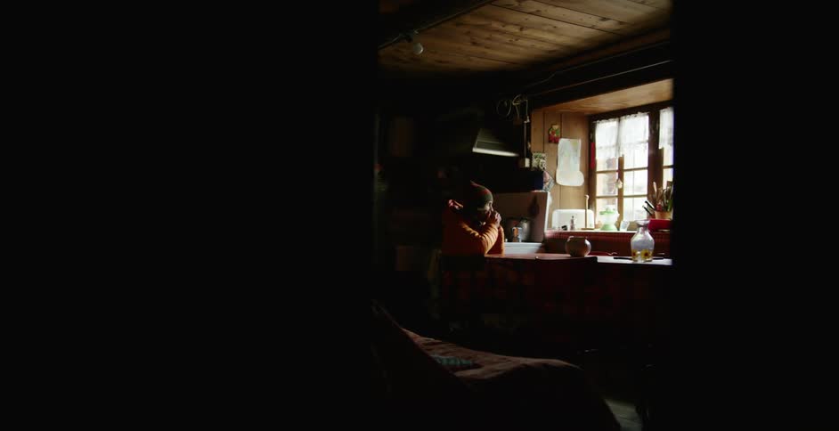 A man sitting at a table in a home