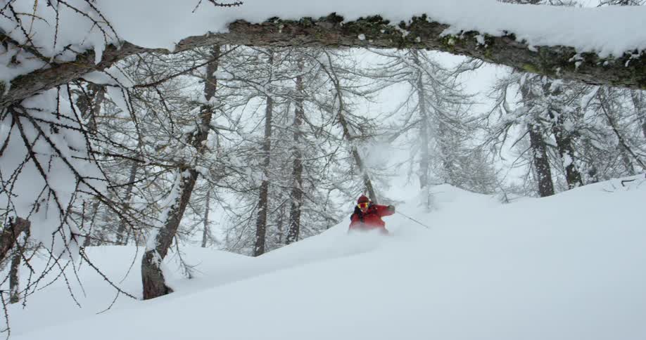 A person is skiing outdoors in winter