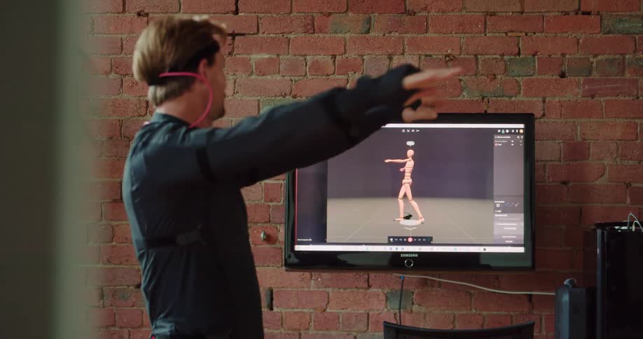 A man plays a virtual reality game projected to his television