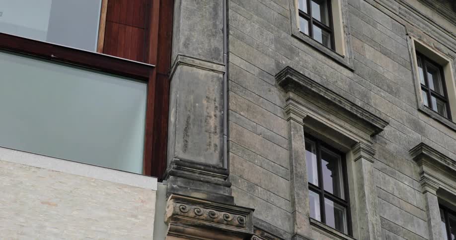 The facade of a building in a city during the day
