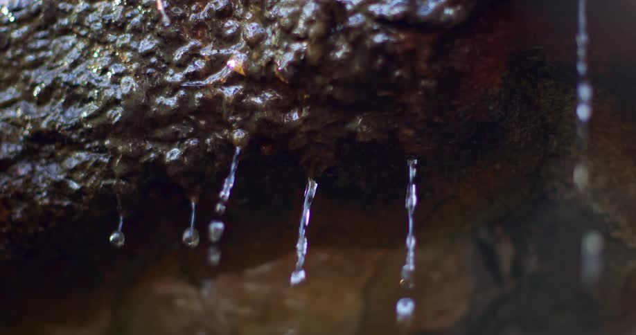 Water dripping from a rock