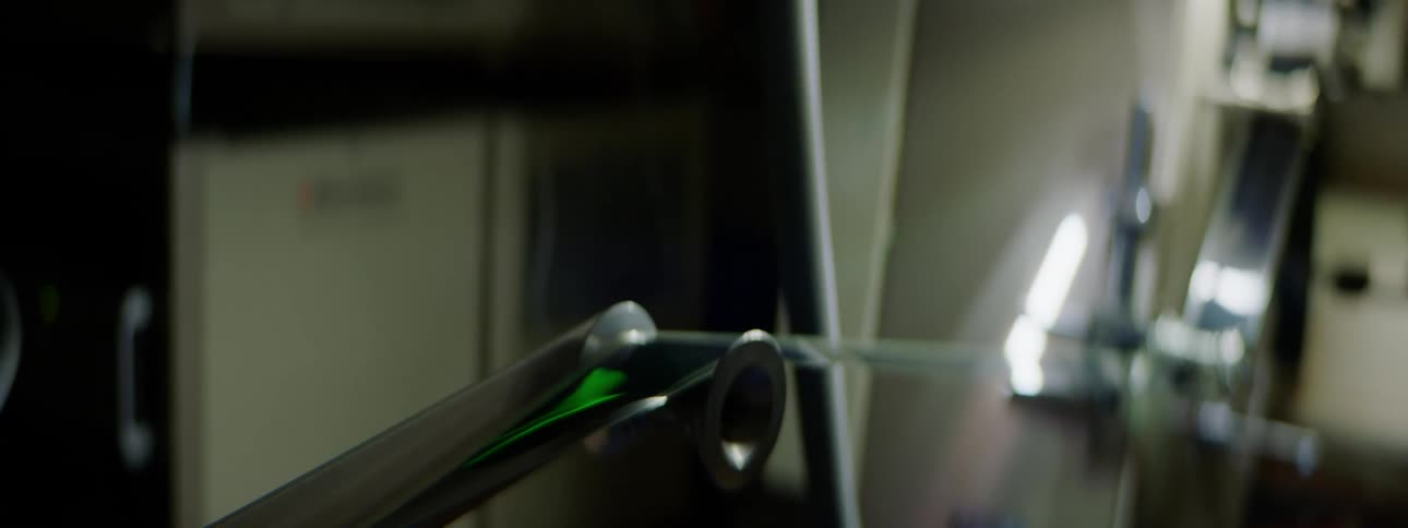 A film projector with film running on a roller