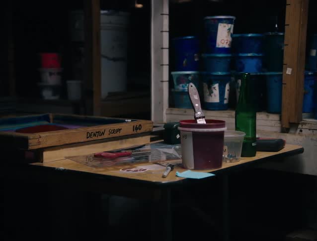Paint and other supplies are in the studio