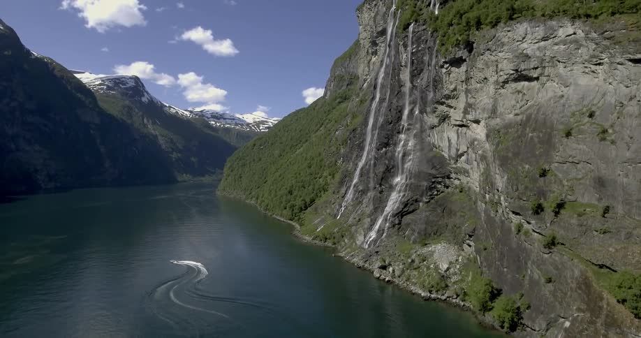 A boat travelling on a mountain river