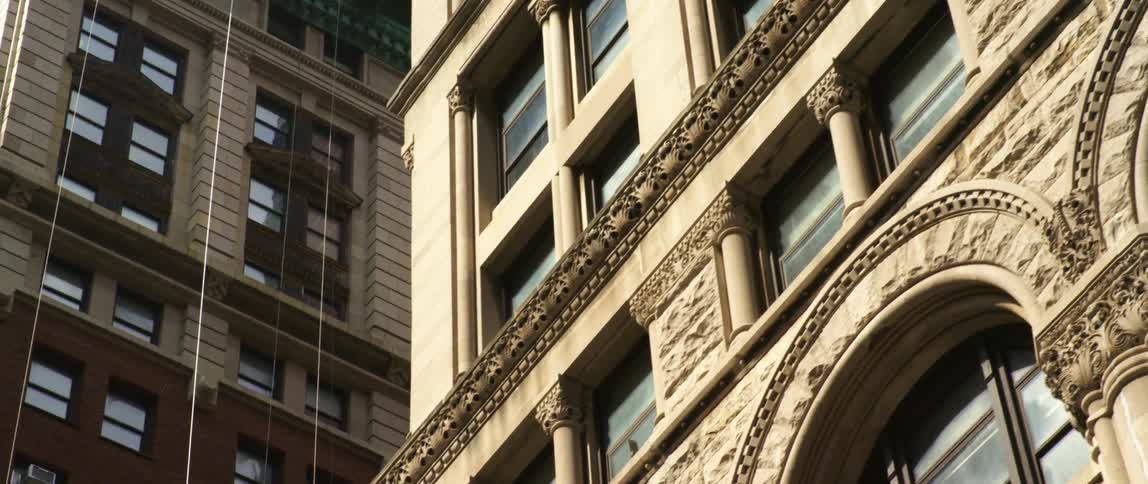 Tall buildings in a metropolis on a city day