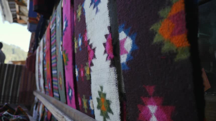 Close up of some items hanging with patterns on them