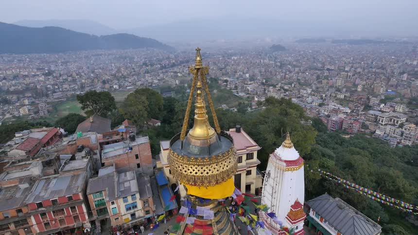 Aerial view of a gold pillar on top of a building