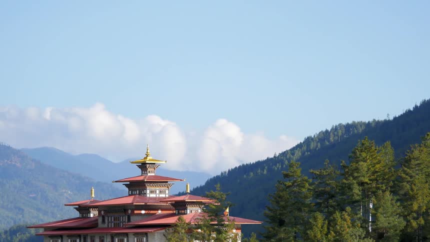 A beautiful temple amid a green mountainous region