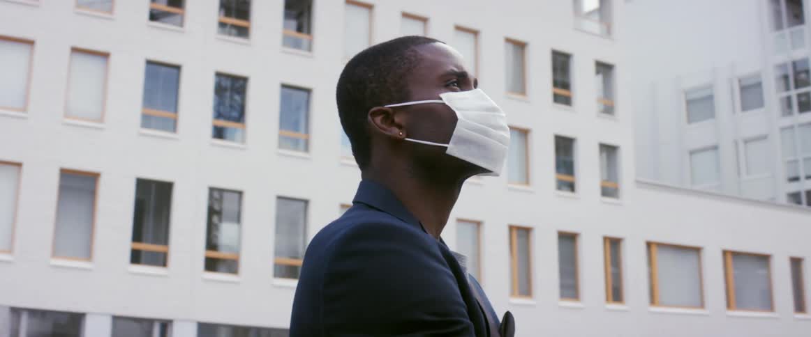 A man walks from the building to a work site