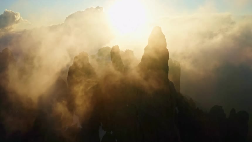 Aerial view of mountains at dusk is displayed