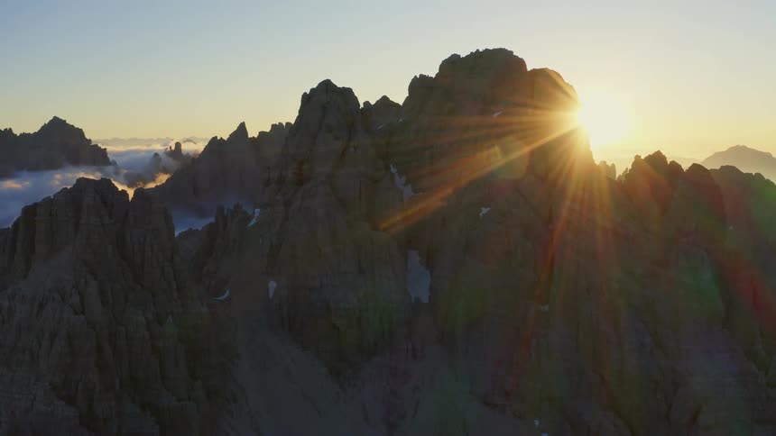 Aerial view of rugged mountains at dusk