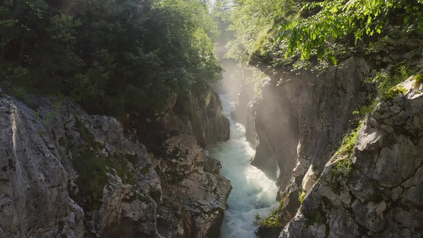 The river runs through the mountains