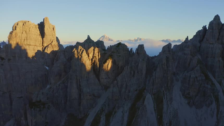 Aerial view of rugged mountains at sunset