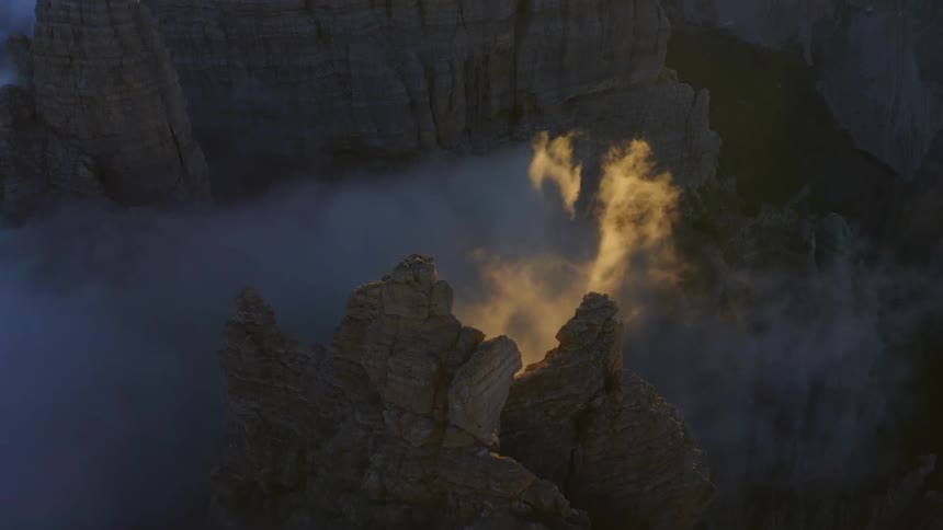 Aerial view of mountain range is displayed