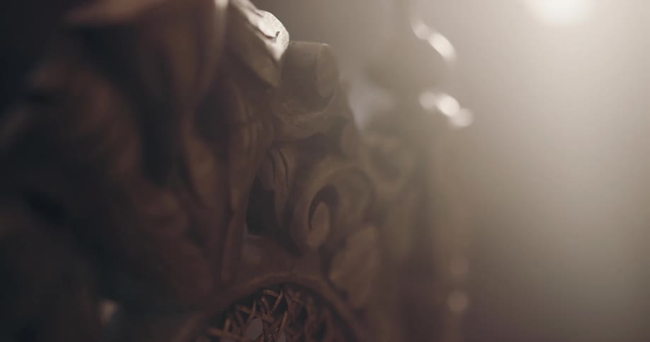A wooden chair with carvings
