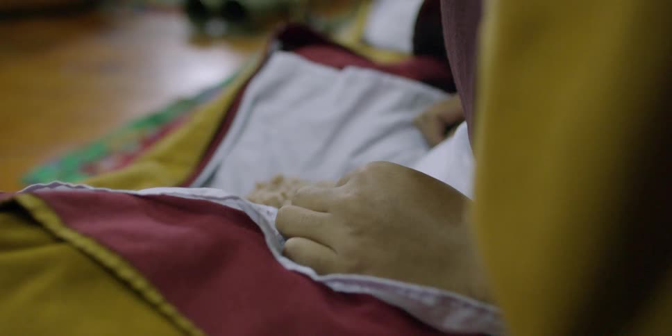 Close up of food on a napkin in a tibetan monk's lap