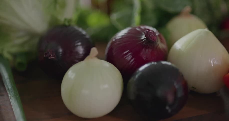 Onions and other produce on a counter top