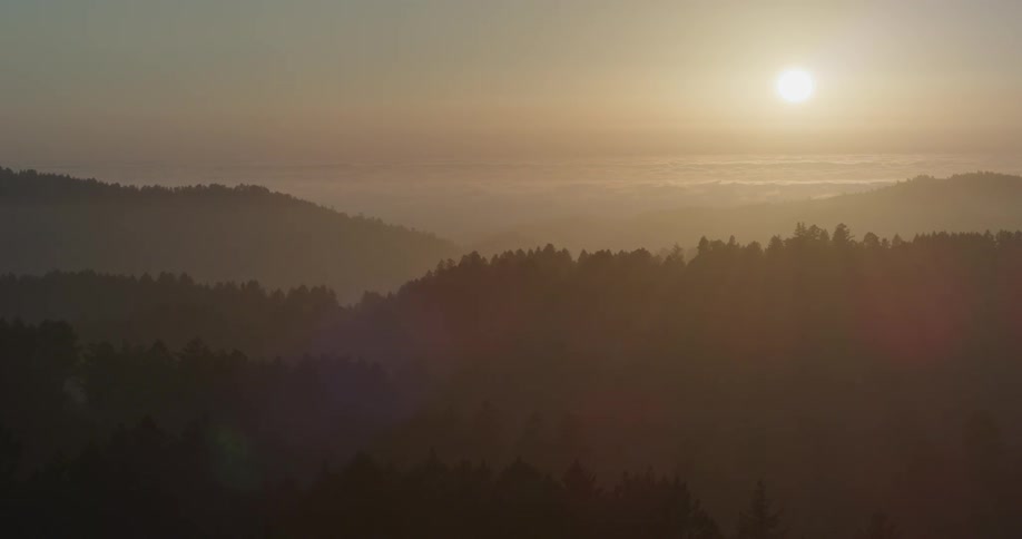 The sun is setting in the horizon
