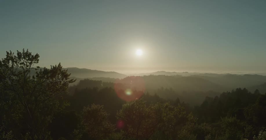 The sun is setting in the horizon