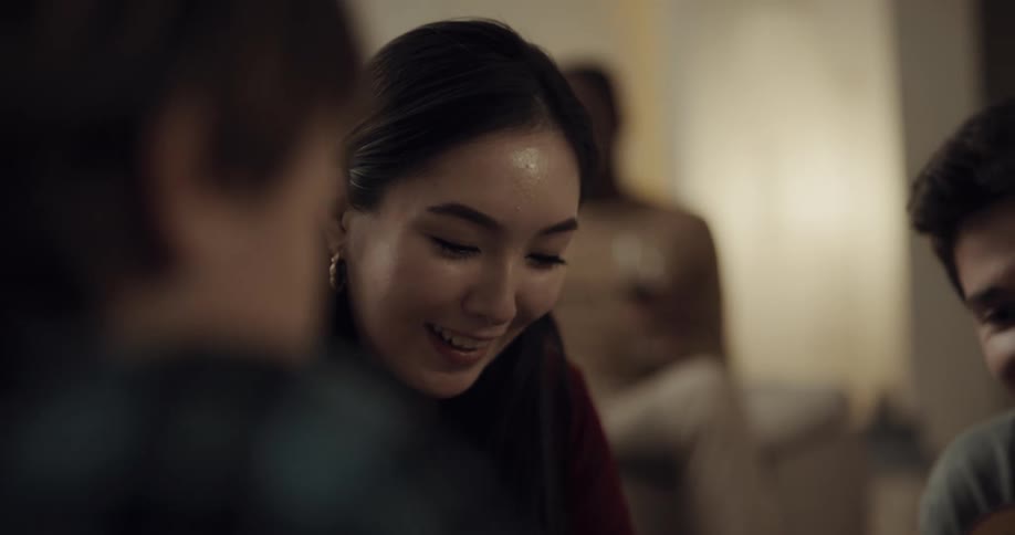 People are having fun together smiling and laughing while seated
