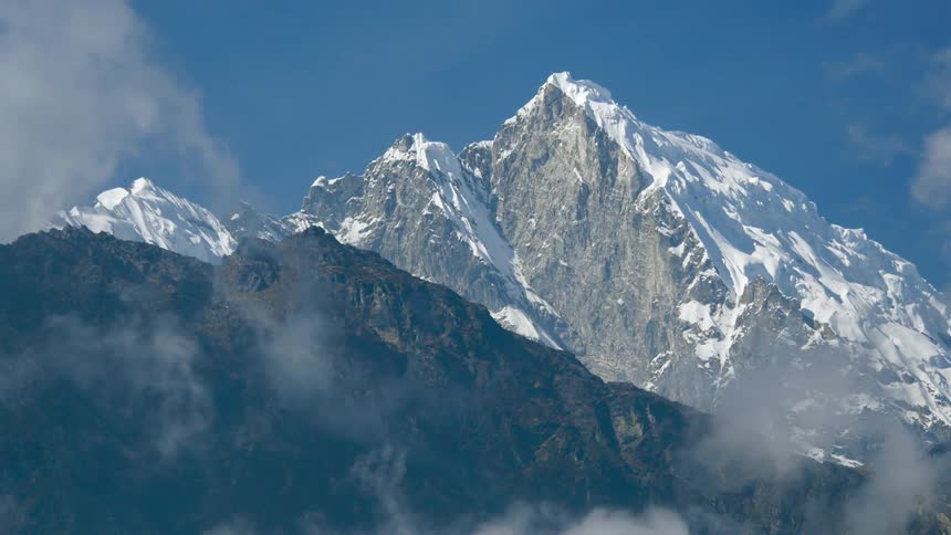 Snow covered mountain on a sunny day