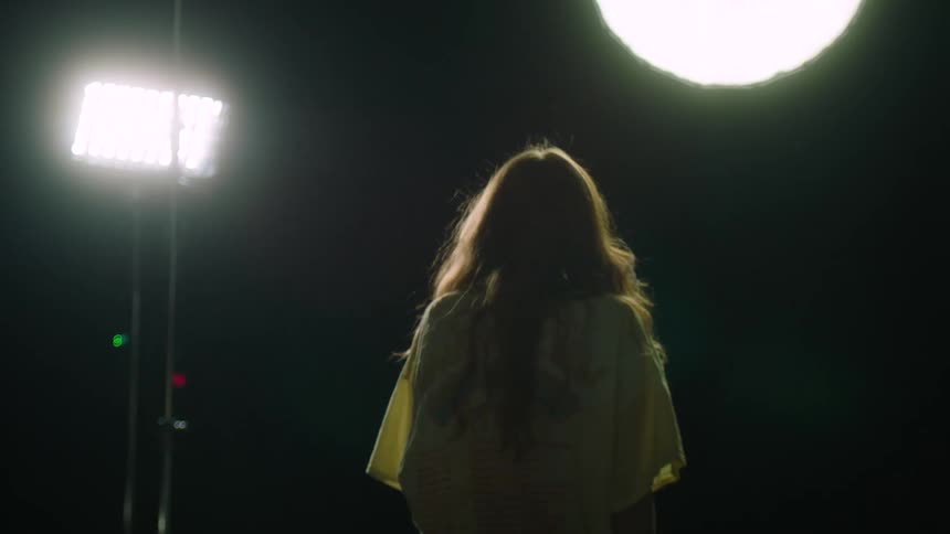 Woman turning around for a photoshoot