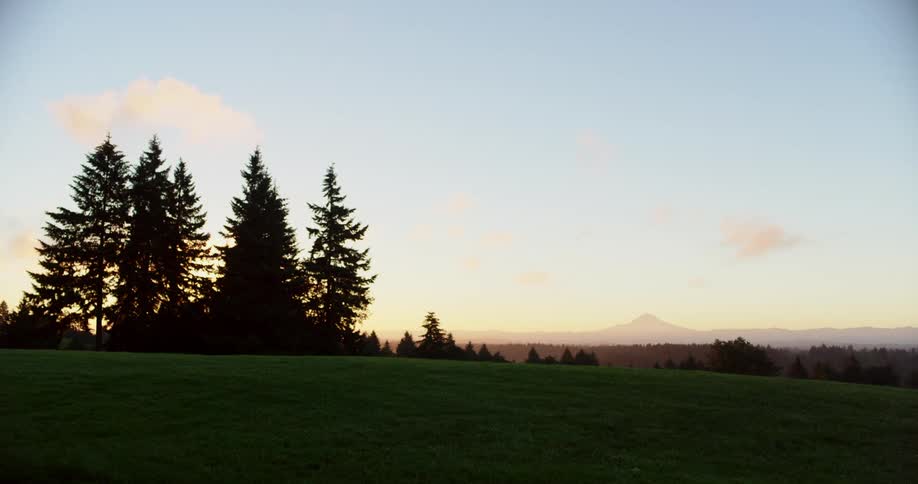 The sun is setting in the horizon