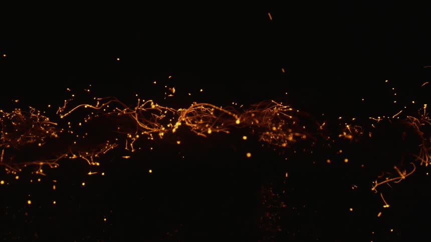 Yellow and orange embers move through a string