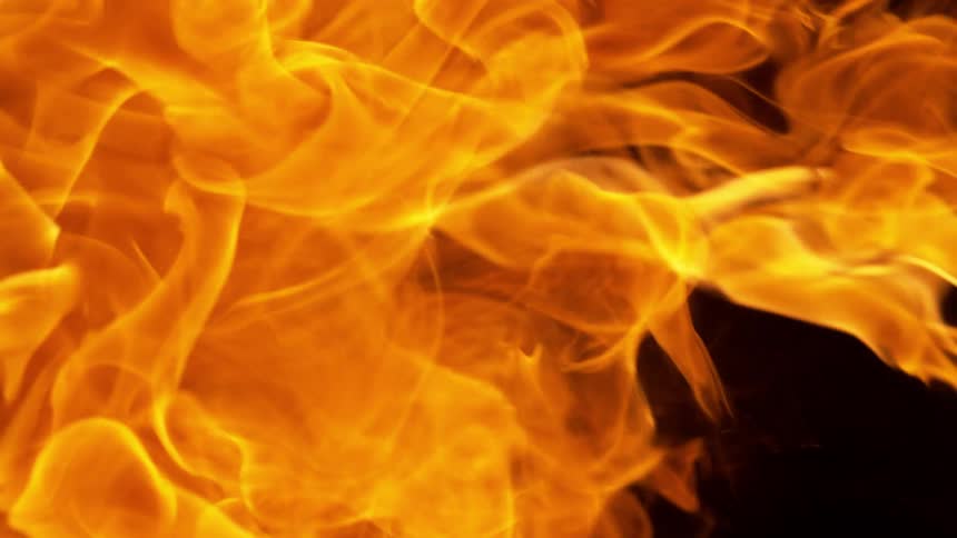 A burst of fire moves across a black background