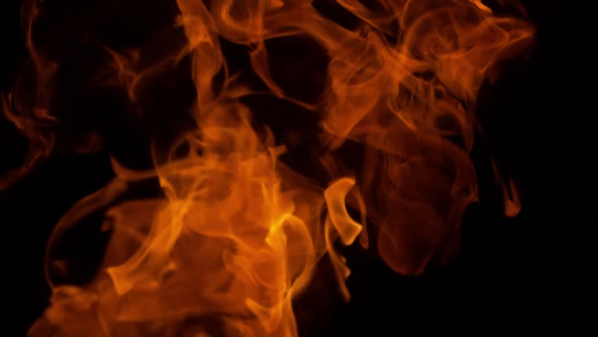 Flames grow higher on a digital screen of a fire