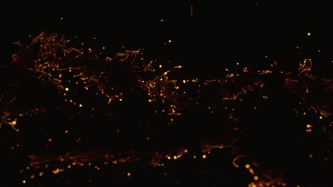 A close up of burning embers in the dark