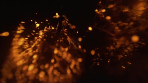 Black orange and yellow colors that look like burning embers in the dark