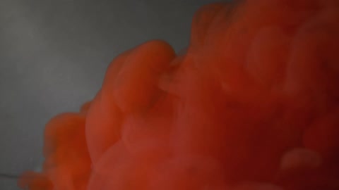Flowing reddish orange liquid