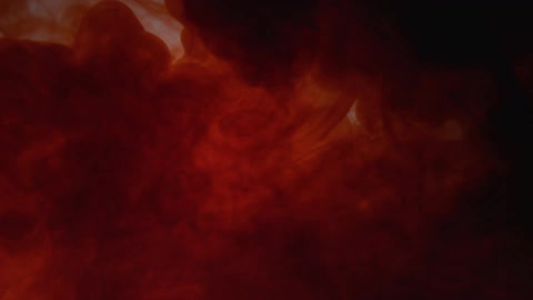 Flowing dark red and orange liquid