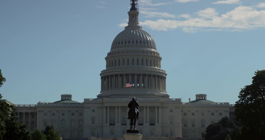A statue in front of a government building
