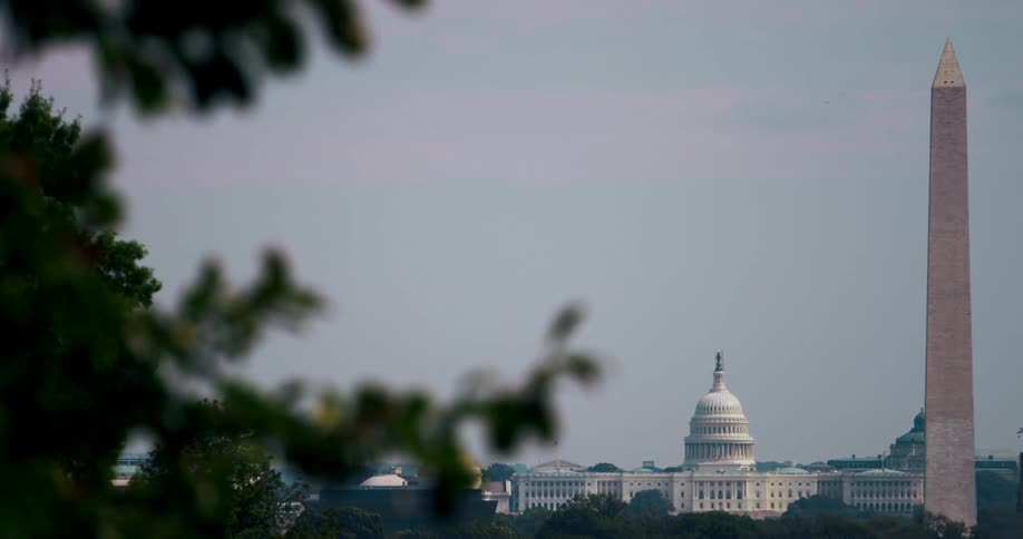 Mist covers washington memorial and nearby capitol building