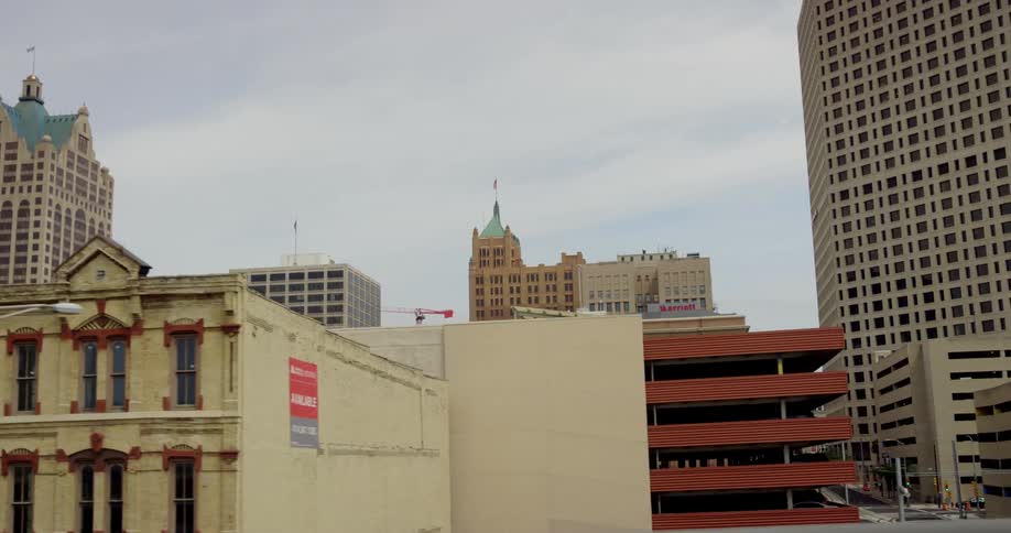 Skyscrapers on the citys downtown skyline from a moving vehicle