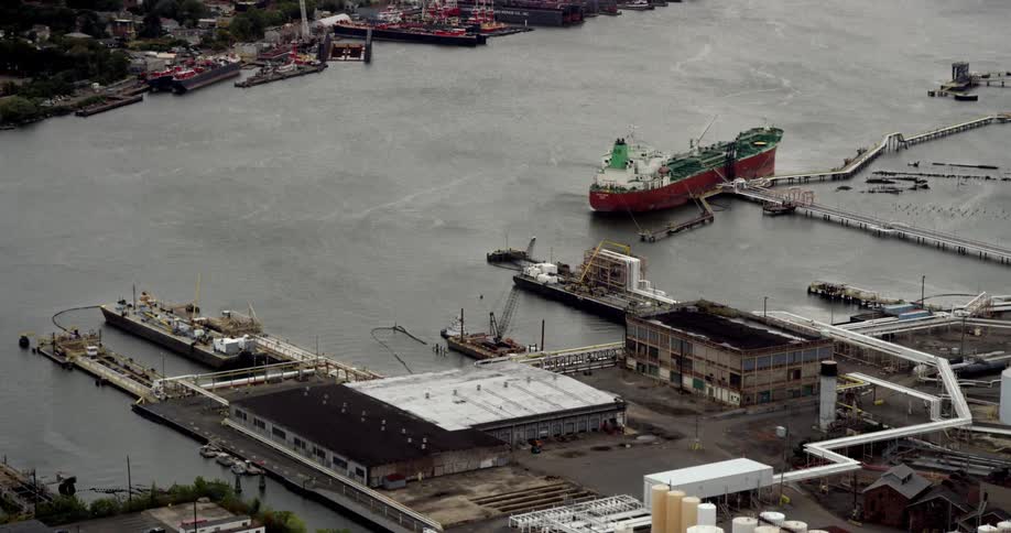 Large ships are docked at the port