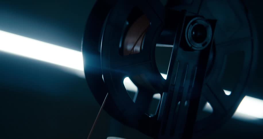 Black spool with brown cable with light
