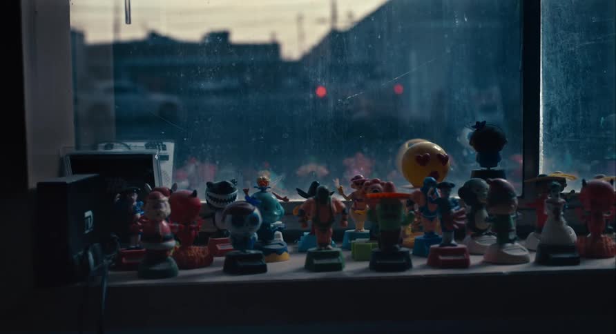 A bunch of figurines on a desk wobbling