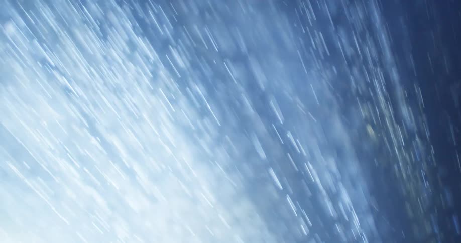 White gray and blue colors that look like water falling with light