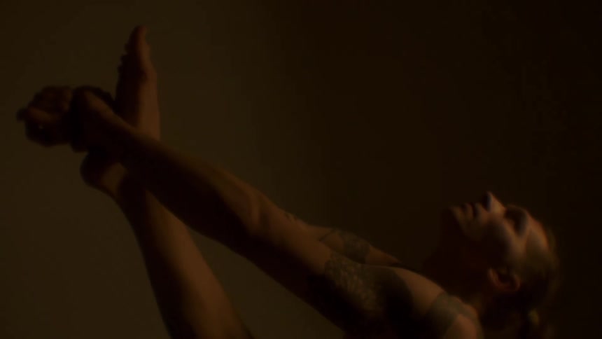 A young woman stretching